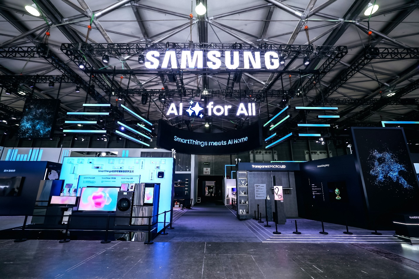 A large room with a sign and a large screen

AI-generated content may be incorrect.